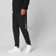 Pantaloni de alergat Tape cu logo - Negru