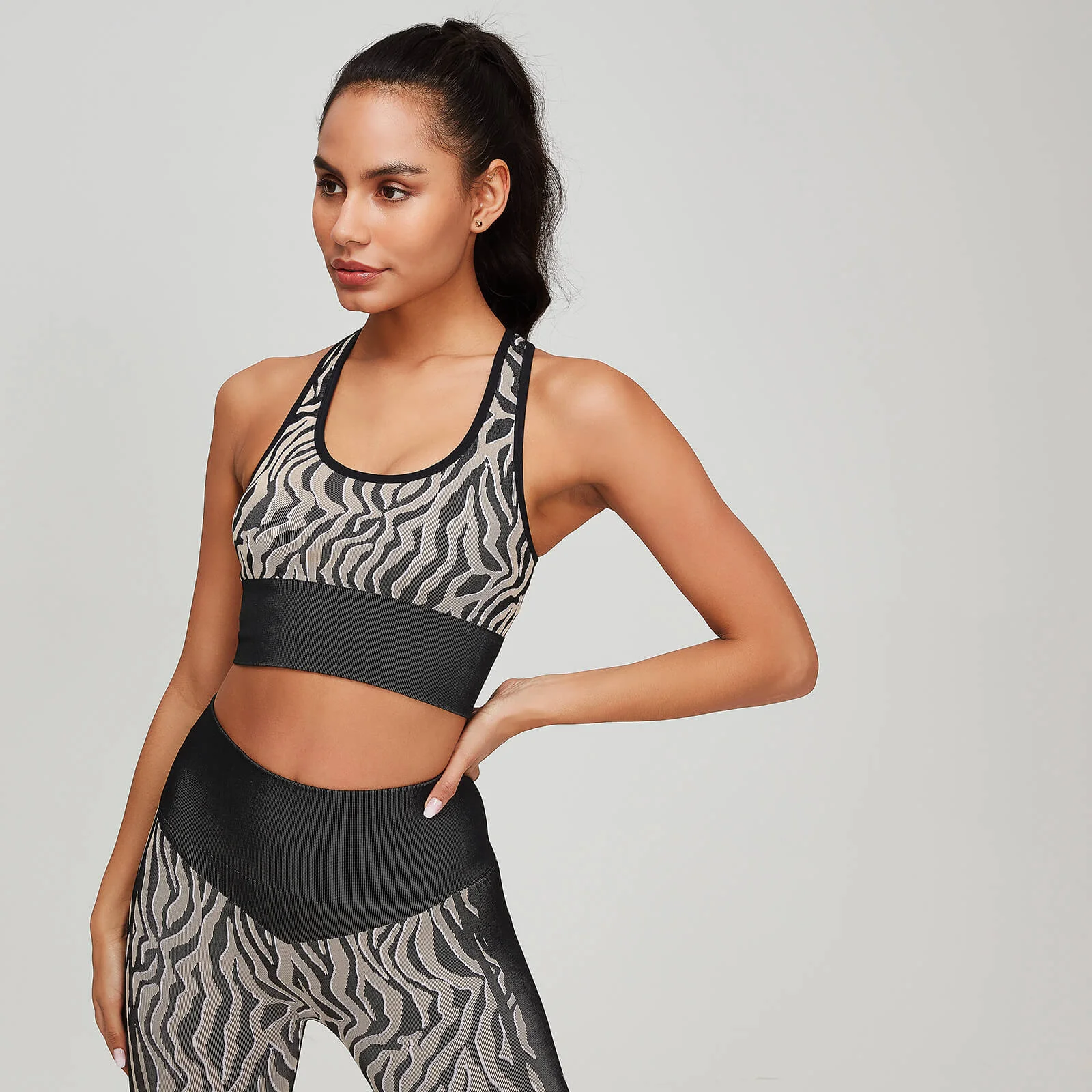 Bustieră Myprotein sport Animal Print pentru femei - Negru/Praline - XS Imagine 1