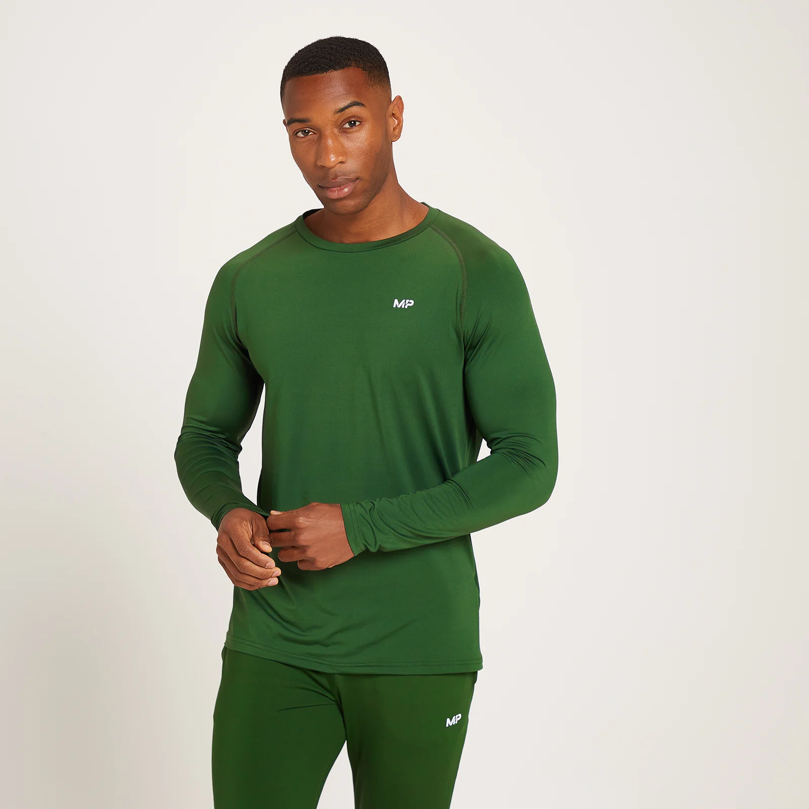 Tricou cu mânecă lungă de antrenament cu grafică MP Linear Mark pentru bărbați - Verde închis - XXS Imagine 1