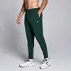 Pantaloni tip jogger din material țesut MP Training pentru bărbați - Dark Emerald