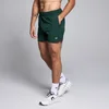 Pantaloni scurți din material țesut cu cusătură de 13cm MP Training pentru bărbați - Dark Emerald